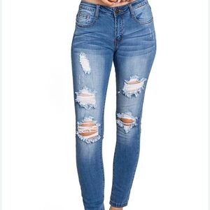 Refuge Distressed Dark Blue Skinny Jeans mid rise use.